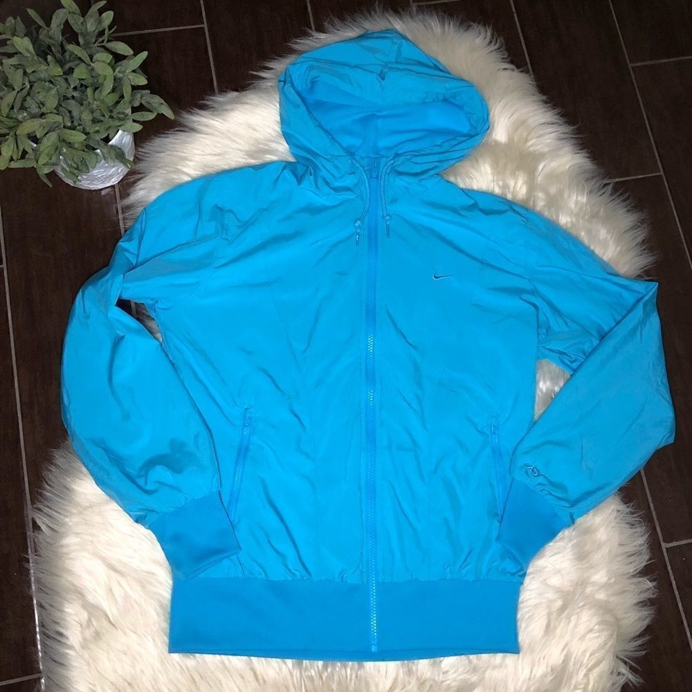The athletic depart. turquoise hooded windbreaker